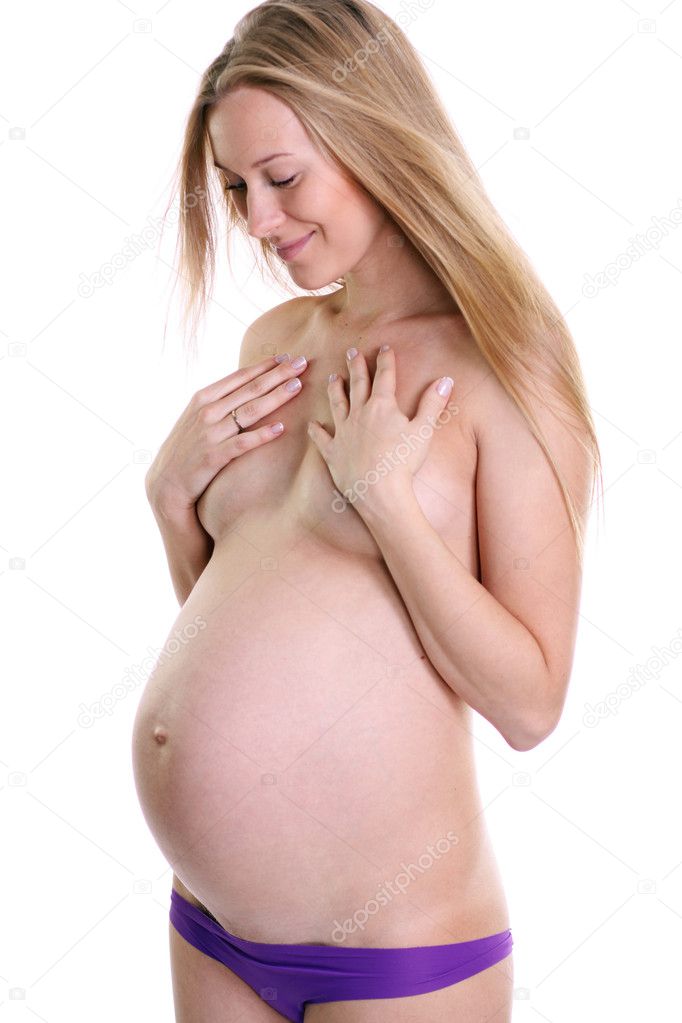 Барышня показывает голый беременный животик