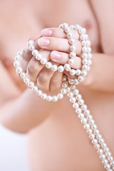 stock image Pearls in the women's hands