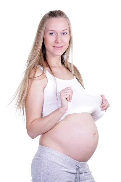 stock image Undressed pregnant female holding her breasts