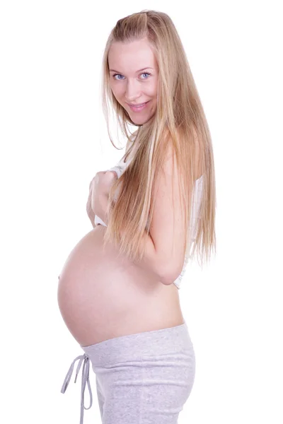 stock image Undressed pregnant female holding her breasts